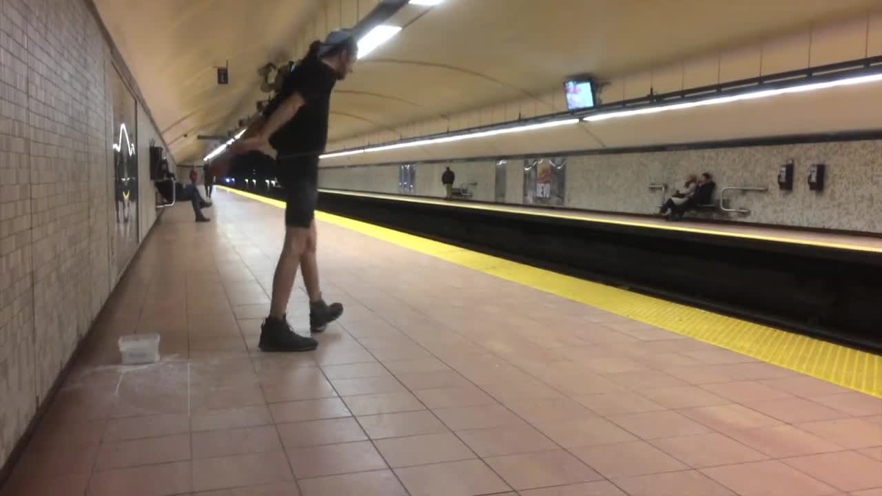 Strong Man Moves Subway Train