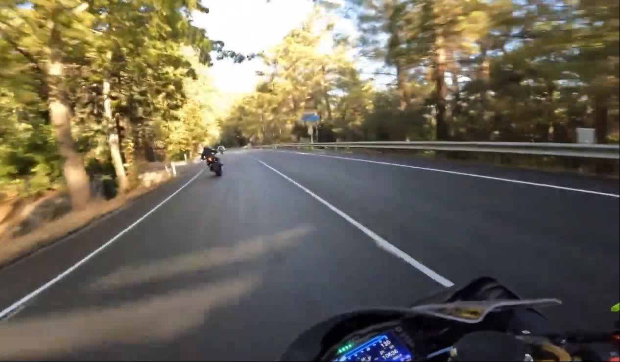 Riding a Yamaha R6 and running up the hill with my friends