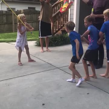 Pinata-Holding Father Gets Taken Down