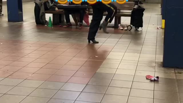 Man dances to "she's a bad mama jama' in heels in a subway station