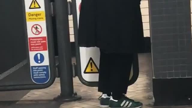 Man pees inside subway station