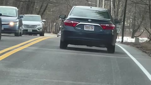 Swerving Car Crashes Into Parked Van