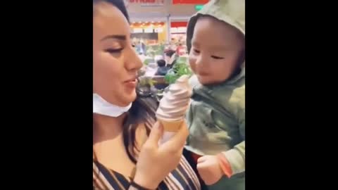 Baby eating ice is very cool..