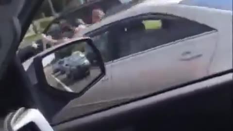 Biker Knocked Over In Road Rage