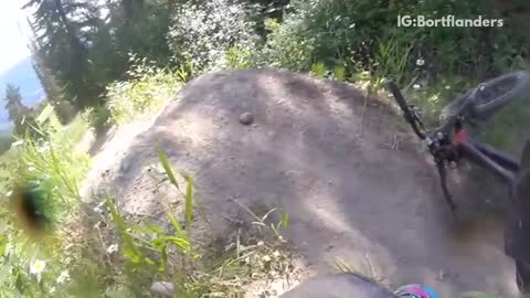 First person man rides mountain bike green gloves falls off