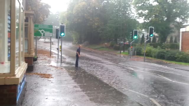 Crazy Man getting soaked by giant puddle