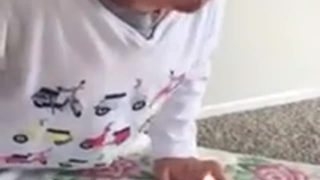 FUNNY KID TRYING TO BLOW OUT A STUBBORN CANDLE