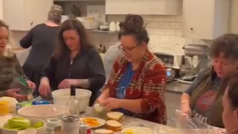 Army of Patriotic women make sandwiches for the Canadian truckers