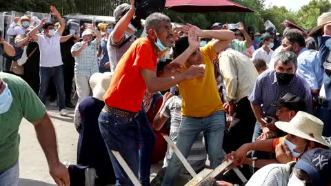 Tunisia in chaos after president, army oust govt