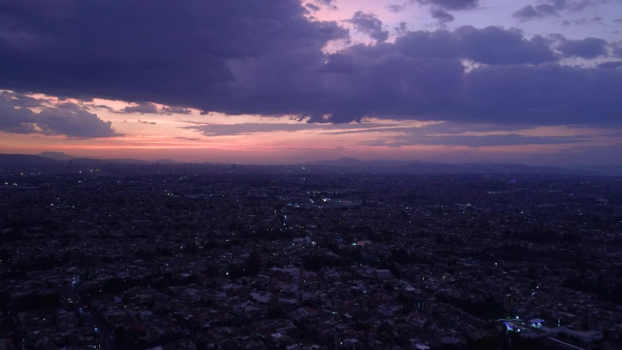 Aerial landscape of a huge city at dusk