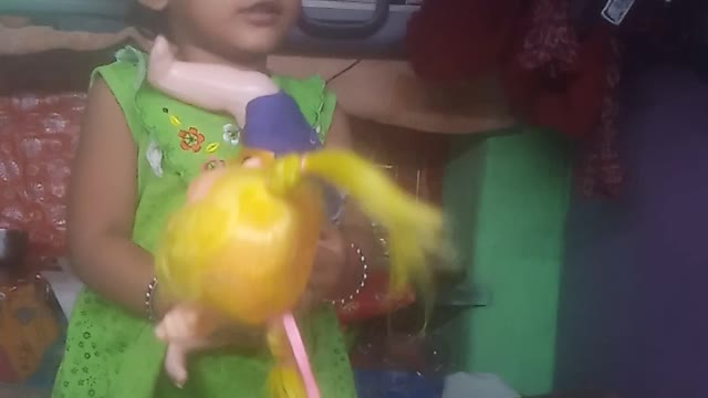 How a baby girl is talking to a babydoll in anger How a baby girl is talking to a baby doll in anger