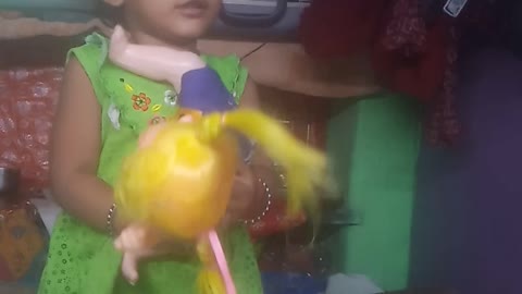 How a baby girl is talking to a babydoll in anger How a baby girl is talking to a baby doll in anger