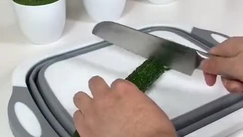 Chopping board cum vegetable basket