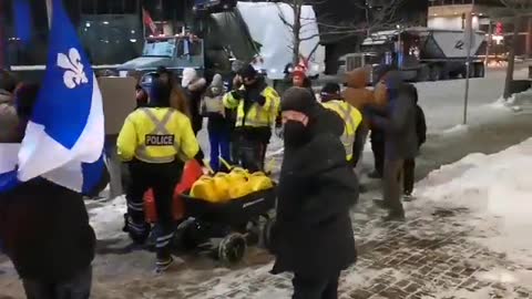 Video shows police seizing Jerry cans of fuel under orders of Mayor Watson.