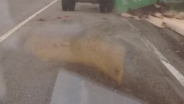 Drunk Driver Flips Trailer Filled With Lumber