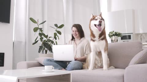 Woman and Dog on the Couch