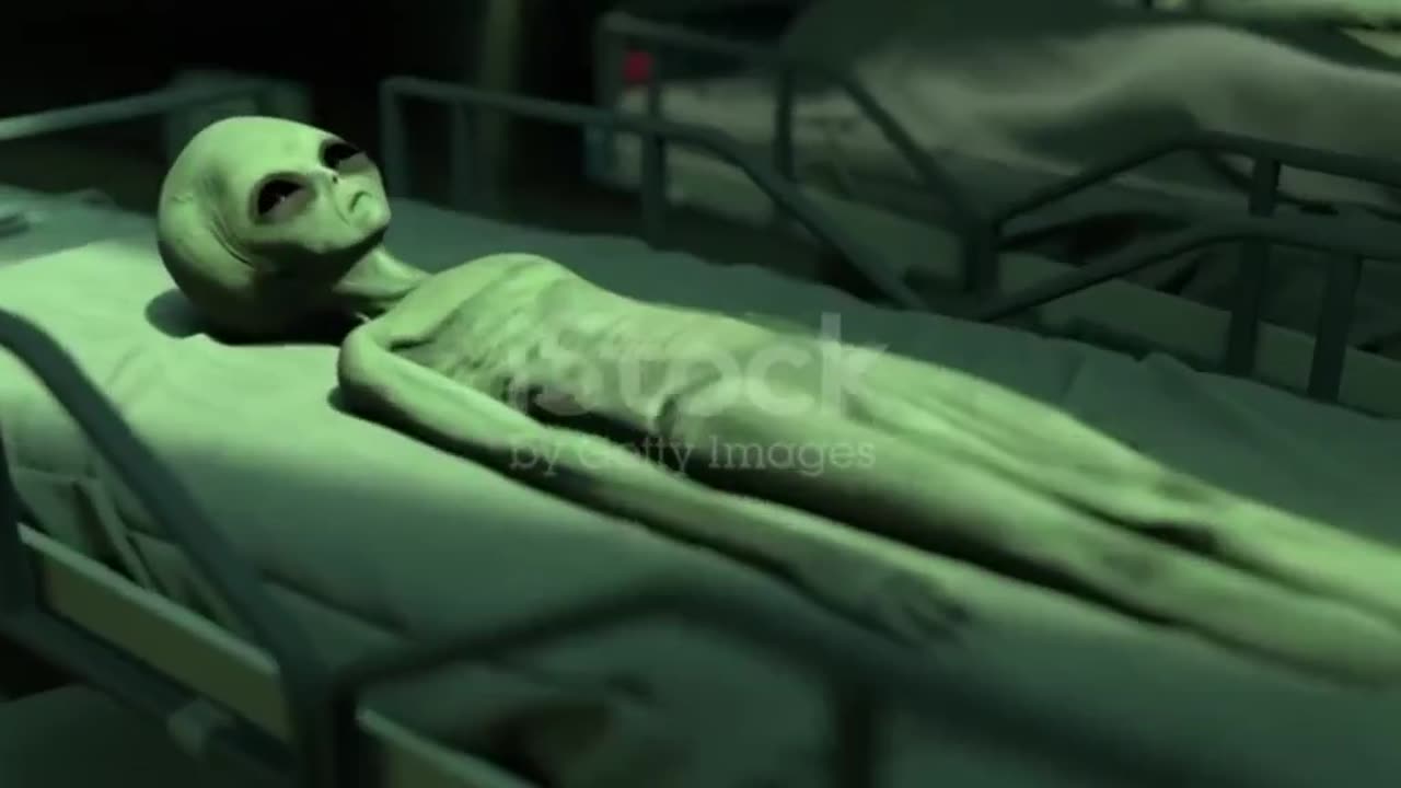 AN ALIEN IS DYEING AND DISAPPEARING