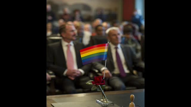 First same-sex couple to get married in Germany celebrate with a kiss