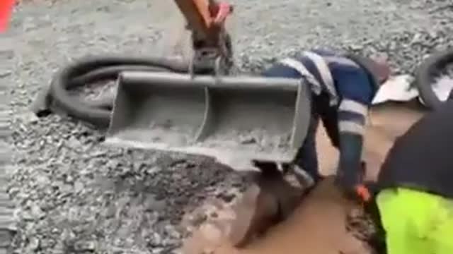 Excavator accidentally pushed man in a pit