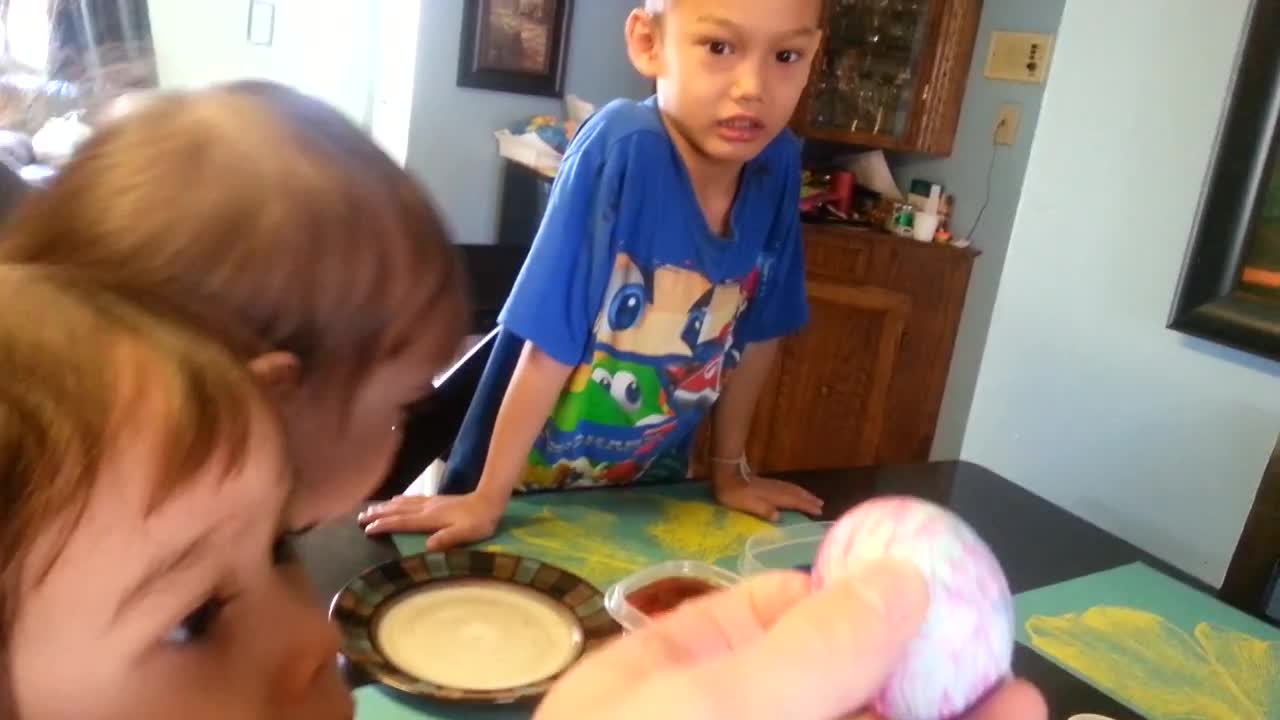 Dad steals and eats his kid's painted Easter eggs!