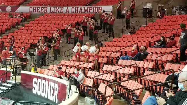 PICTURE SLIDE OF SOONERS VS WEST VIRGINIA BASKETBALL GAME 2021