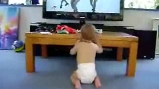 Come See the Softer Side of baby watching TV .