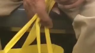 Yellow bag really long thumb finger nail