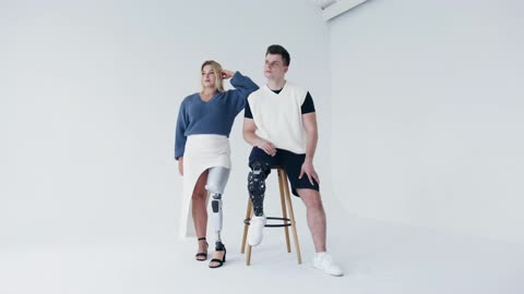 A Man And a Woman Wearing Prosthetics Leg