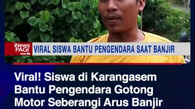 Viral! Siswa di KarangasemBantu Pengendara GotongMotor Seberangi Arus Banjir