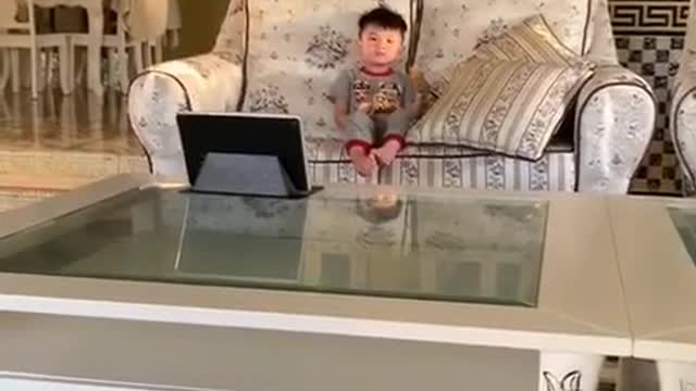 Baby see happy with cartoon