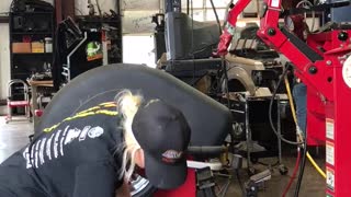 Girl Performing a Reverse Mount at the Shop