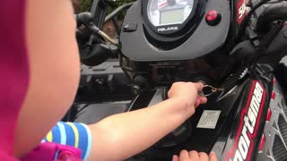 Teaching Gavin how to start the Sportsman 500 H.O.