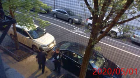 2020 0501 807 pm NYPD at the building's entrance