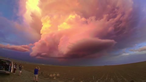 An oil painting of cumulonimbus clouds