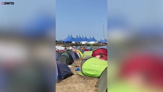 Tornado sweeps through UK music festival sending tents flying into the air - SWNS