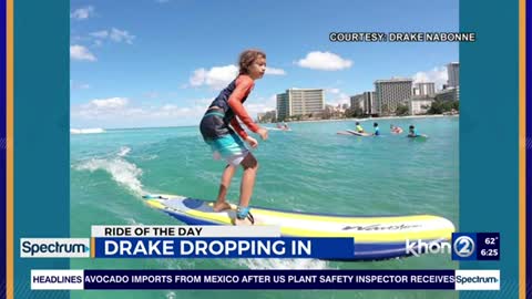 Drake has fun catching waves in Waikiki