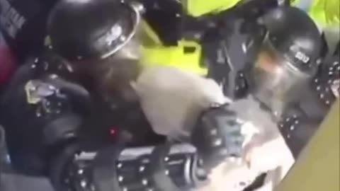 January 6 Capitol Police Officer Jabbing Man with Object