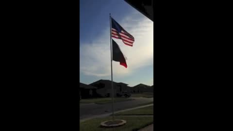 US and Texas Flags Flying