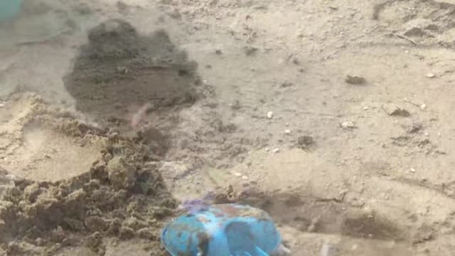 Superhero Baby's Solo Sand Play