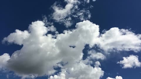 Fluffy Clouds on a Sunny Day