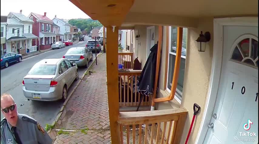 Funy A cop covering camera before knocking the door. (Cute Video)