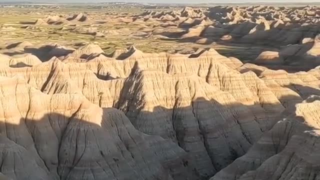 The dramatic landscapes of Badlands National Park span layered rock formations