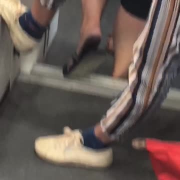 Dude why black dirty feet in sandals subway