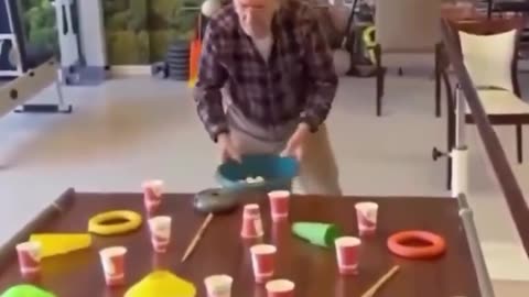 This guy is a social worker, coach, and fitness trainer brings fun games to nursing home residents