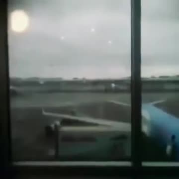 UFOs showing up at an airport terminal