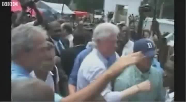 Featured 03/31/2010: Bush Wipes The Haitian Off On Clinton