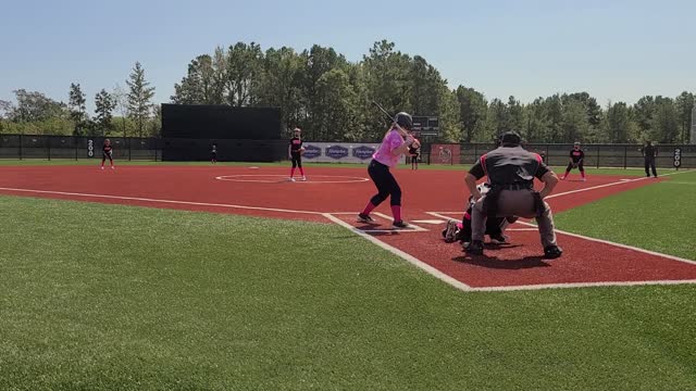 Zoe pitching low outside corner