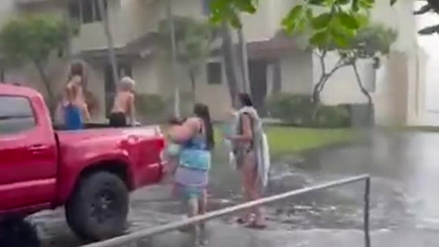 Waves crash over roof of 2-story condo in Hawaii