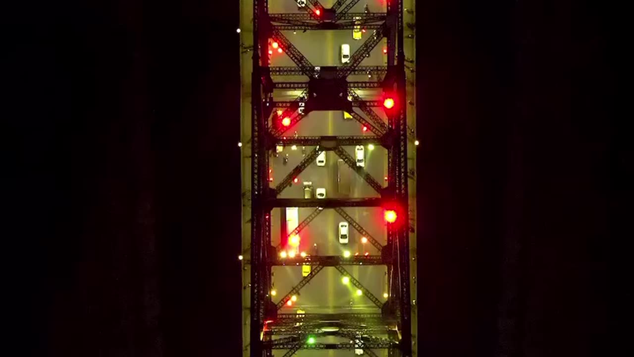 "Howrah Bridge: A Spectacular Fusion of Day and Night Views"