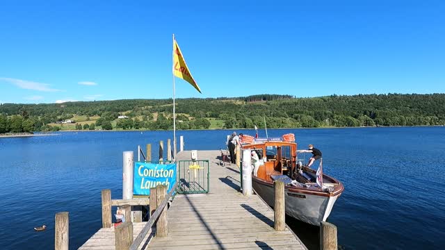 Getting off the boat at lake Coniston. After a boat tour of the lake.